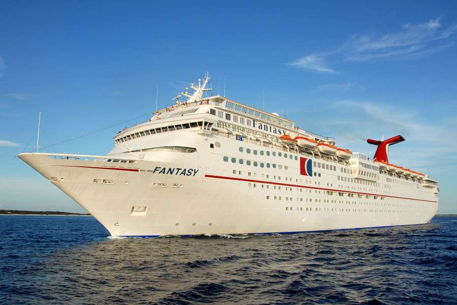 The Carnival Fantasy cruise ship, illuminated with Tigua floodlights